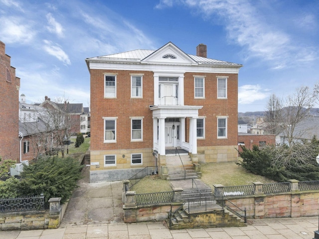 view of neoclassical home