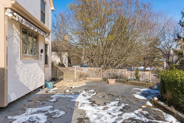 view of snow covered patio