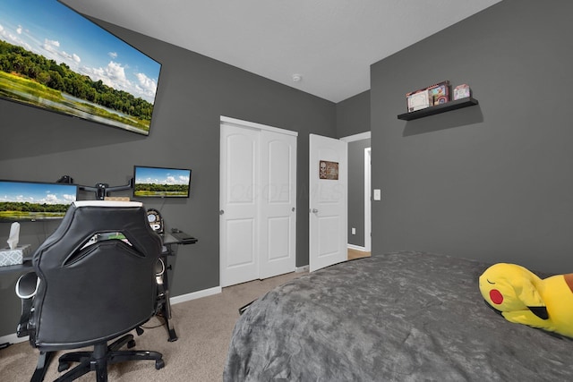 bedroom with carpet flooring and a closet