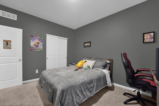 bedroom with light carpet