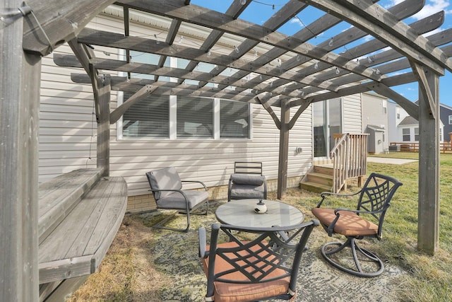 view of patio featuring a pergola