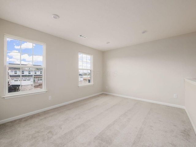 view of carpeted spare room