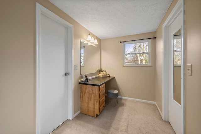 bathroom featuring a textured ceiling