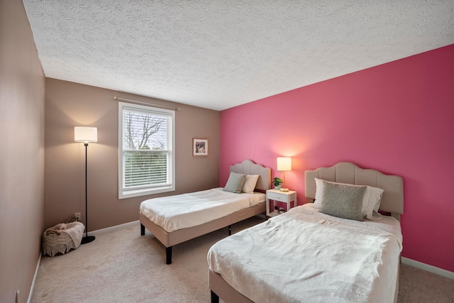 carpeted bedroom with a textured ceiling