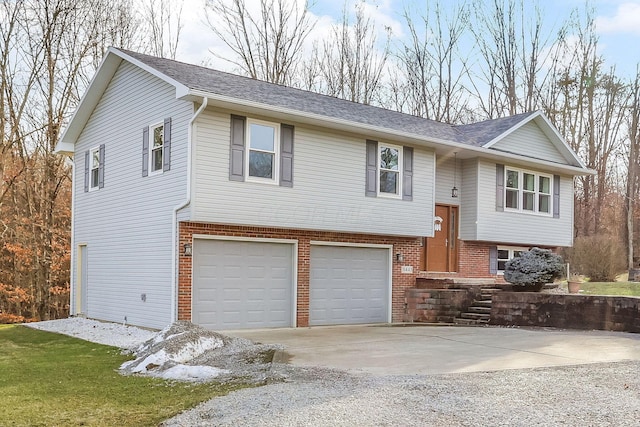 split foyer home featuring a garage