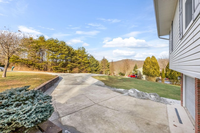 view of patio / terrace featuring a mountain view