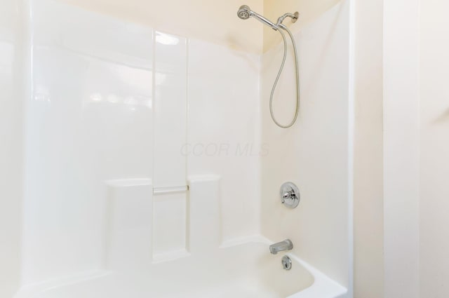 bathroom featuring bathing tub / shower combination