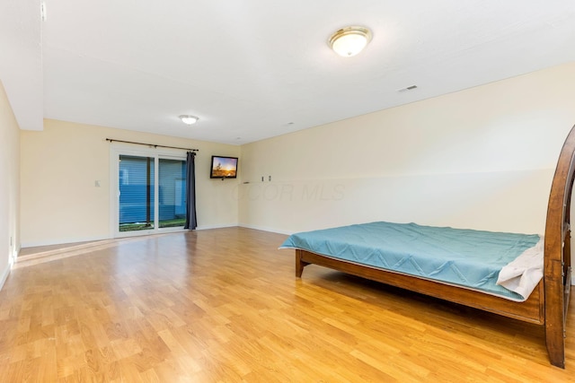 bedroom featuring light hardwood / wood-style floors