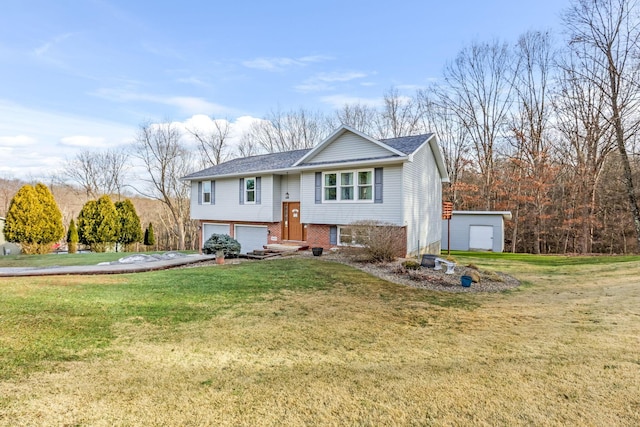 bi-level home with a garage and a front lawn