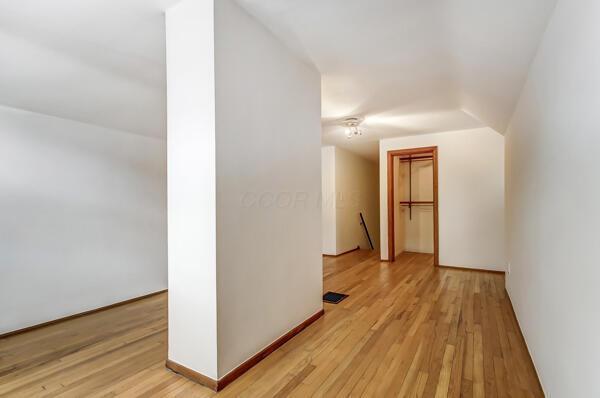 bonus room featuring light hardwood / wood-style floors