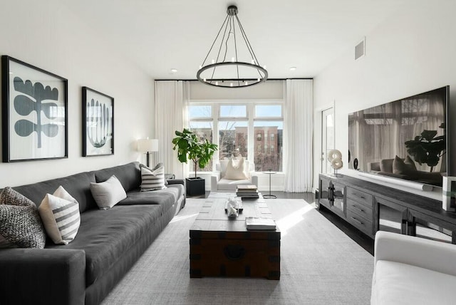 living room with a chandelier