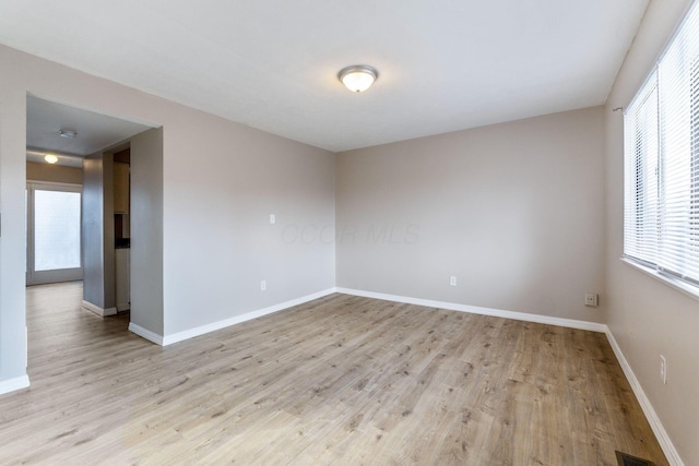 empty room featuring light wood-type flooring