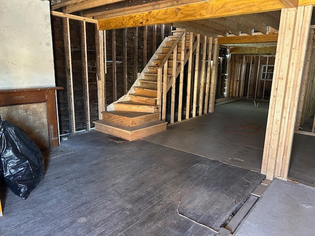 basement featuring dark wood-type flooring