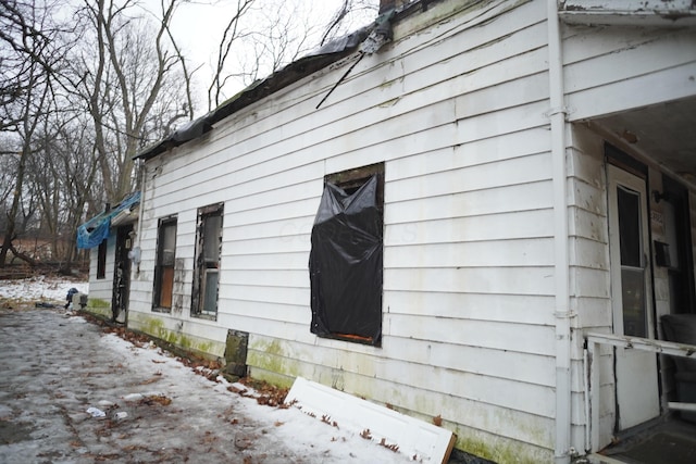 view of snow covered property