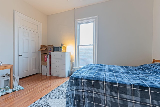 bedroom featuring hardwood / wood-style floors