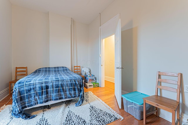 bedroom featuring hardwood / wood-style flooring