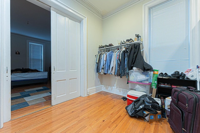 spacious closet featuring hardwood / wood-style flooring