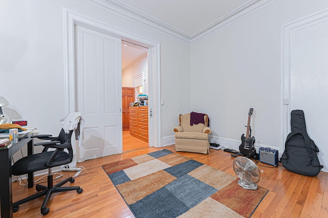 office featuring crown molding and hardwood / wood-style flooring