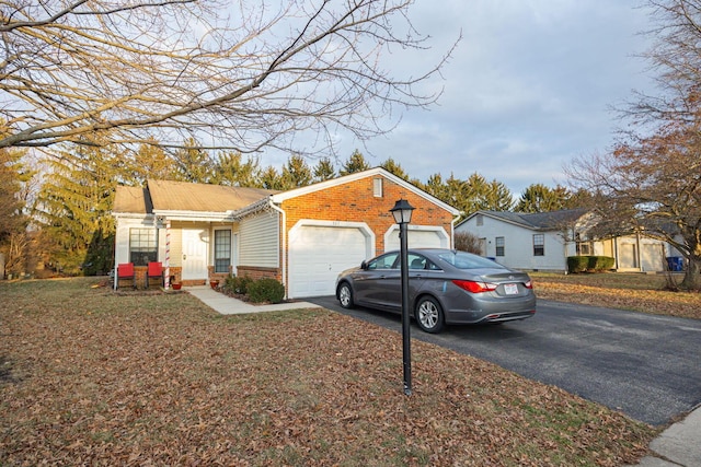 single story home featuring a garage