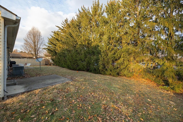 view of yard featuring central AC