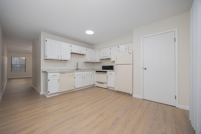 kitchen with white appliances, light hardwood / wood-style floors, sink, and white cabinets