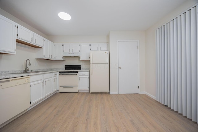 kitchen with white cabinetry, sink, white appliances, and light hardwood / wood-style floors