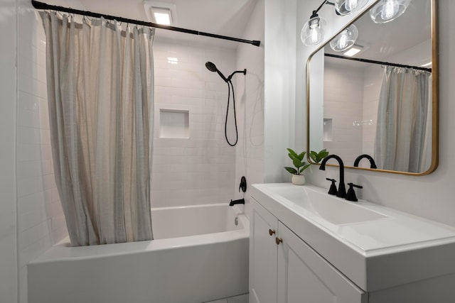 bathroom with shower / bath combo and vanity