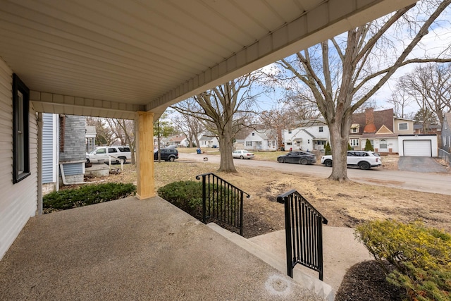 view of patio featuring a porch