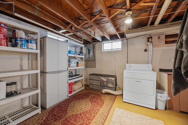 basement featuring washer / dryer and electric panel