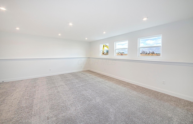 unfurnished room featuring carpet floors and recessed lighting