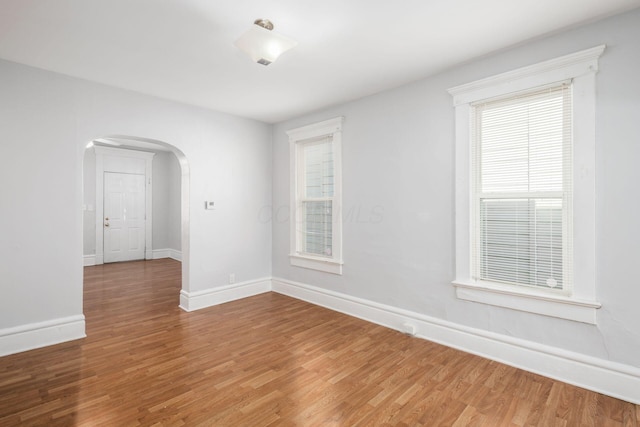 spare room featuring hardwood / wood-style flooring