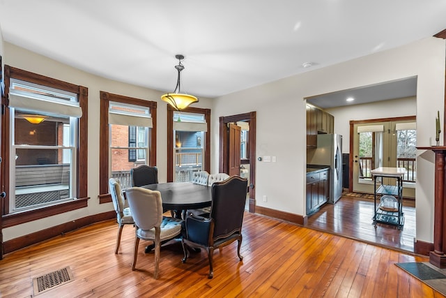 dining room featuring light hardwood / wood-style flooring