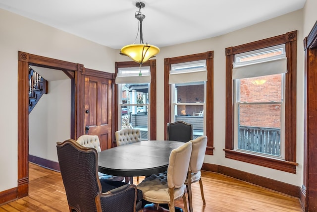 dining room with light wood-type flooring