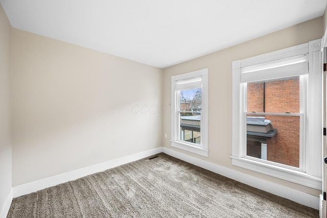 view of carpeted spare room