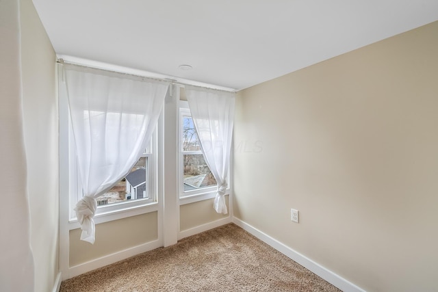 view of carpeted spare room