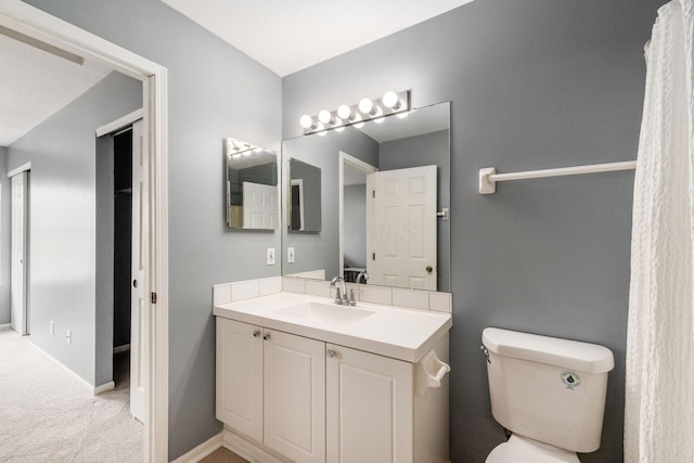 7083 Gallant Fox Dr Unit 4, New Albany, OH 43054 - bathroom with vanity, toilet, and baseboards