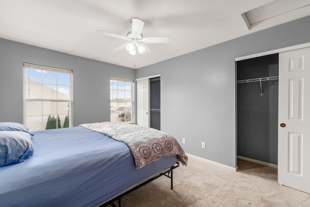 7083 Gallant Fox Dr Unit 4, New Albany, OH 43054 - carpeted bedroom with multiple closets, baseboards, attic access, and a ceiling fan