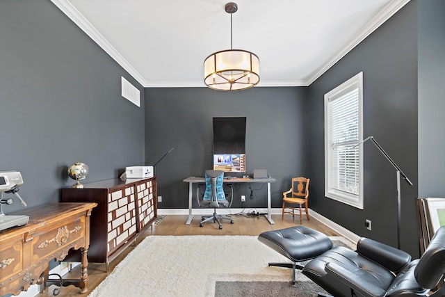 office with ornamental molding, baseboards, and wood finished floors