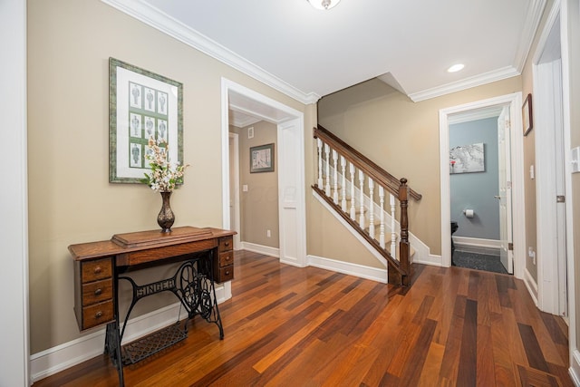 entryway featuring visible vents, stairway, dark wood-type flooring, and ornamental molding