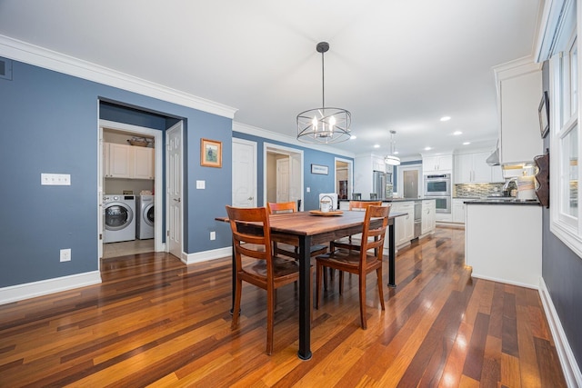 dining area with baseboards, washing machine and clothes dryer, recessed lighting, ornamental molding, and dark wood-type flooring