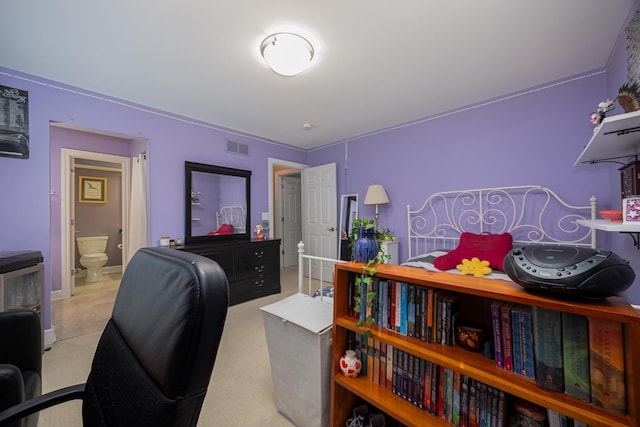 carpeted bedroom featuring visible vents and baseboards