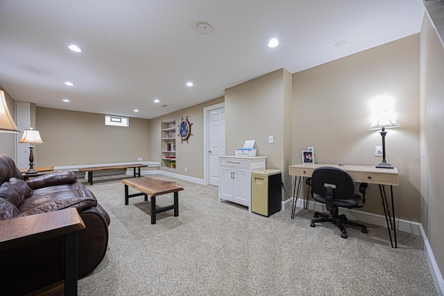 living room featuring recessed lighting, baseboards, and light colored carpet