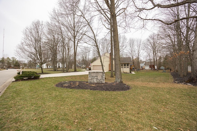 view of yard featuring a garage