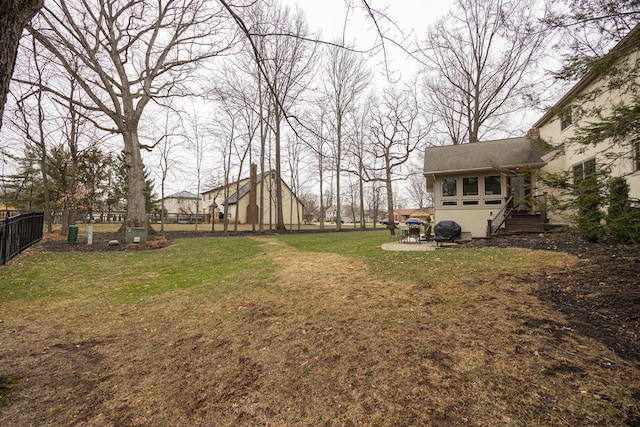 view of yard with fence