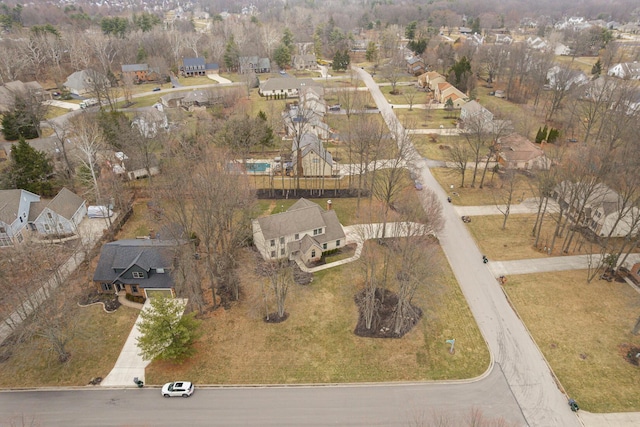 birds eye view of property with a residential view