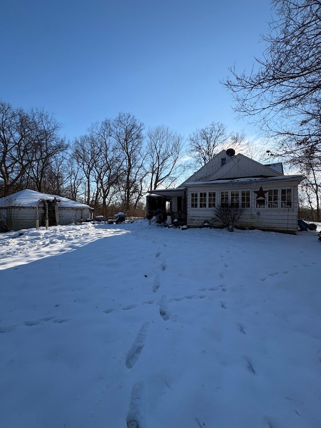 view of yard covered in snow