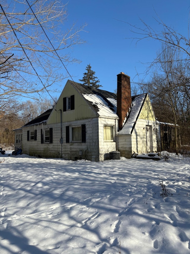 view of snow covered house