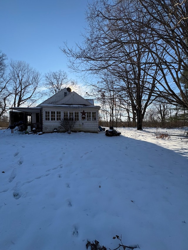 view of snow covered property