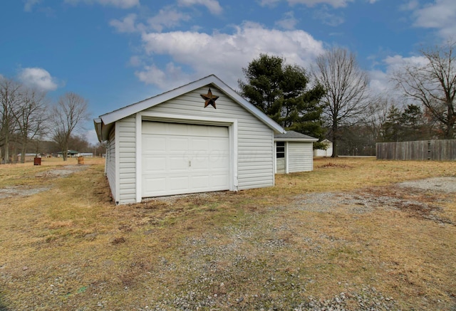 detached garage with fence