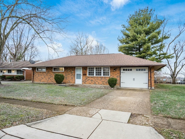 ranch-style house featuring a garage and a front yard